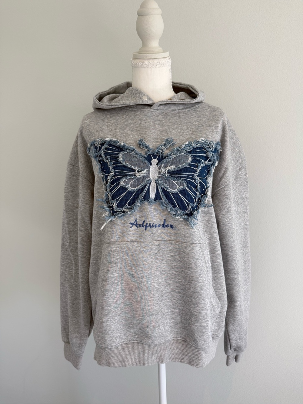 Aelfric Eden Grey Hoodie Sweater with Distressed Blue Denim Butterfly